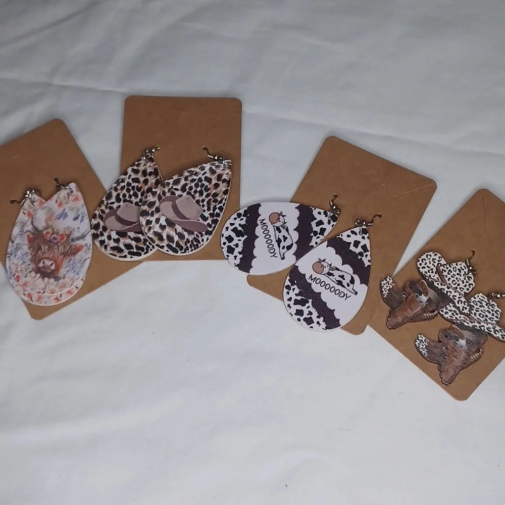 4 pair Cow dangle earrings
